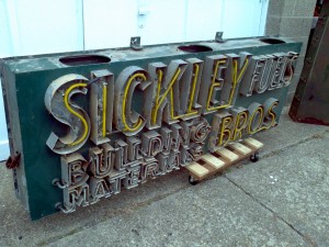 neon sickly brothers sign