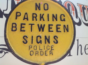 parking sign yellow cast iron 1