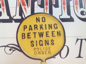 parking sign yellow cast iron 2