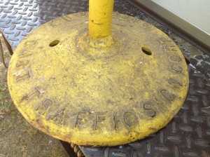 parking sign yellow cast iron