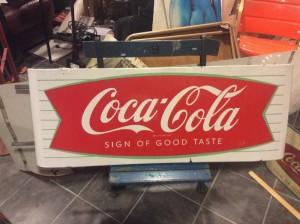 coke sign fish tale